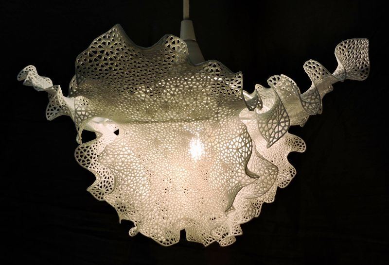 Pendant light with lace-like form