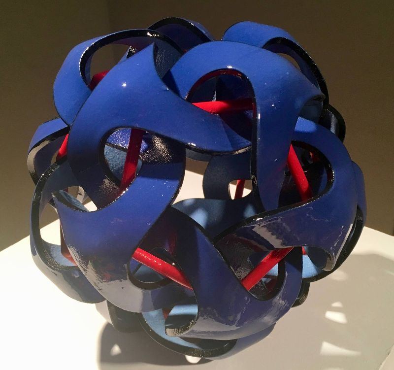 Blue and red woven sculptural form