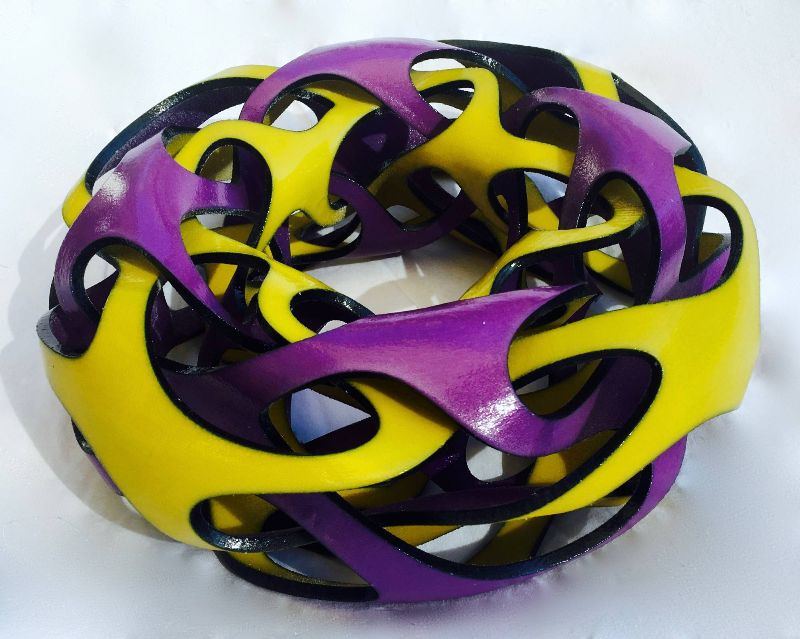 Yellow and purple woven sculptural form